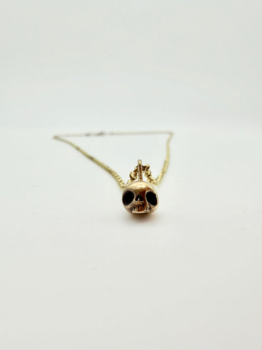 Gold skull necklace