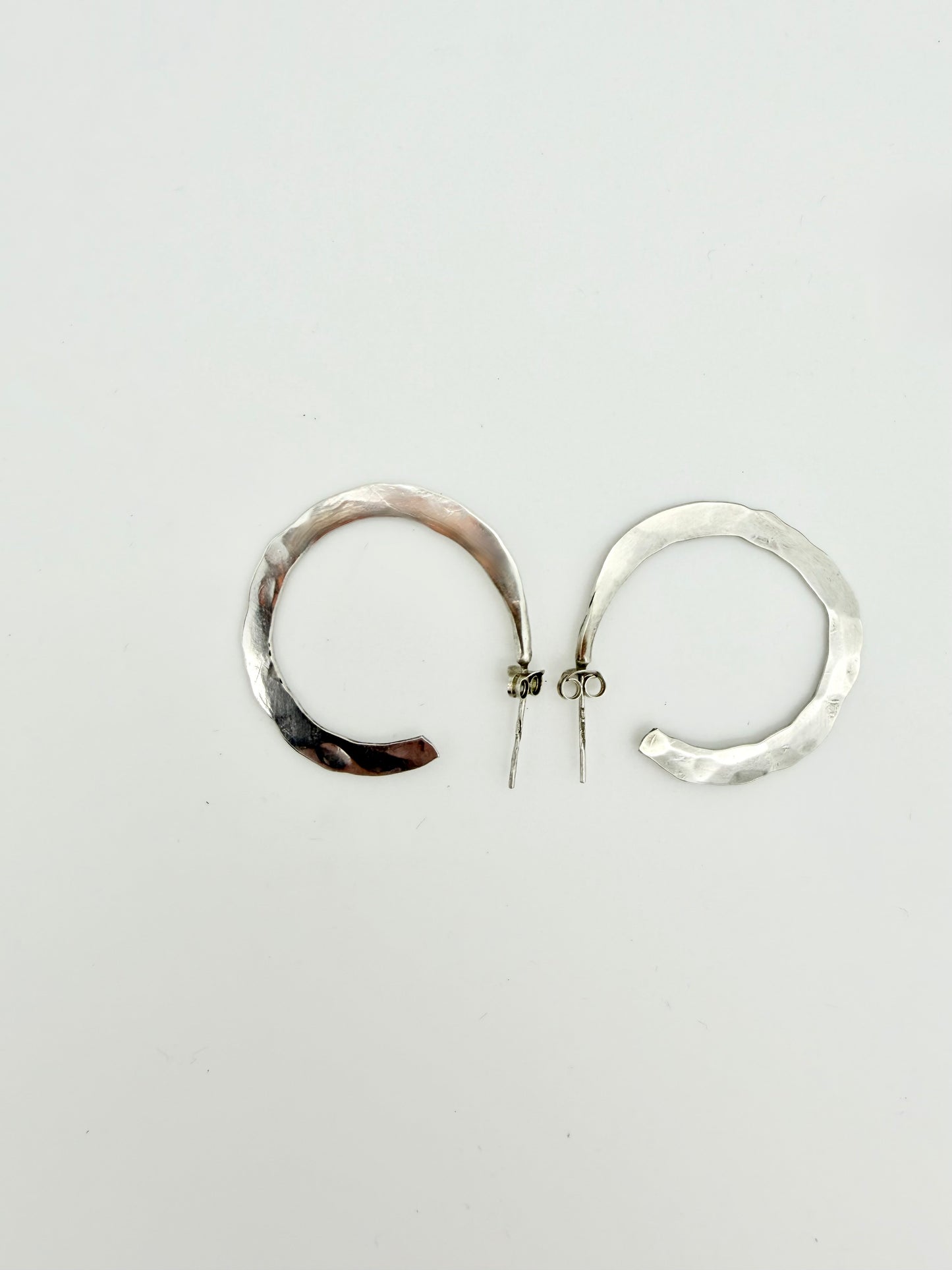 Hammered silver hoop earrings