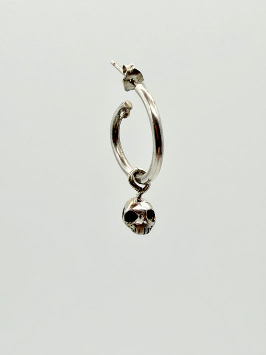 Skull charm hoop earrings — handmade gold and silver by Virginia Allan