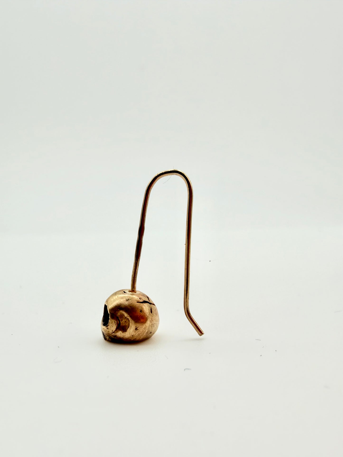 Gold skull drop earrings — handmade 9ct gold by Virginia Allan