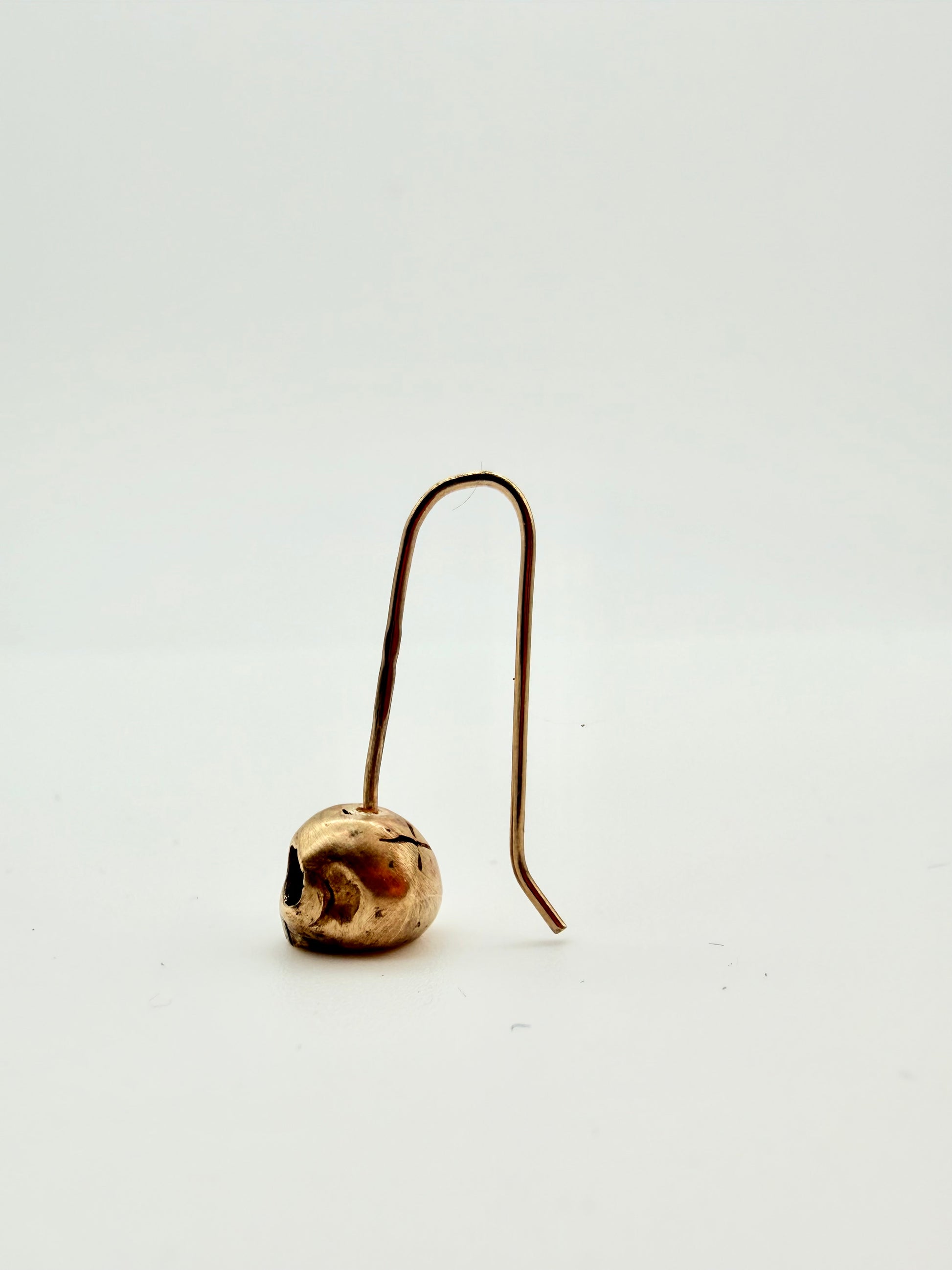 Gold skull drop earrings — handmade 9ct gold by Virginia Allan