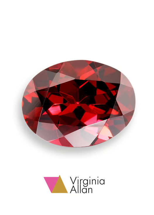 Garnet gem set in a silver hammered ring for a birthstone